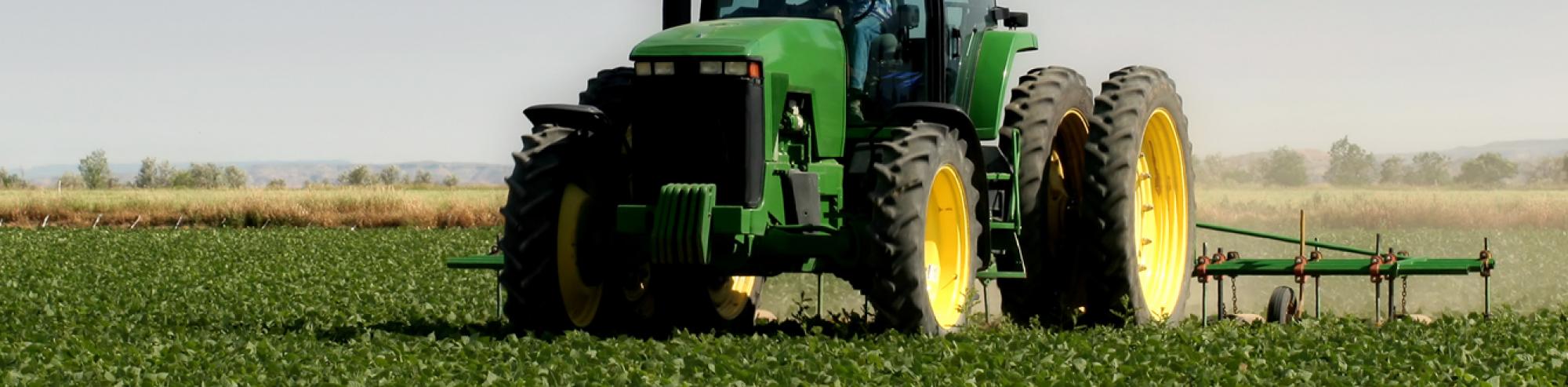 tractor harvesting crops